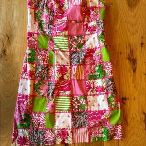 cute dress in good condition does have a small spot but it can be washed out